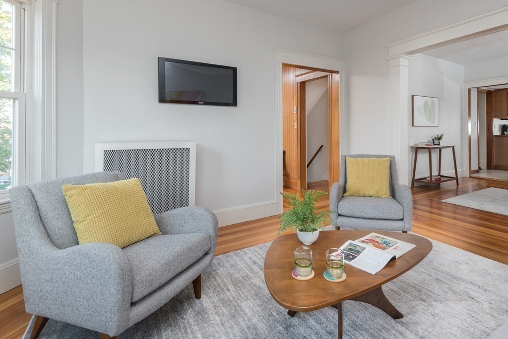 7 Gorham Road Medford, MA 02155 - Photo 5 of 42 a living room with furniture and a flat screen tv