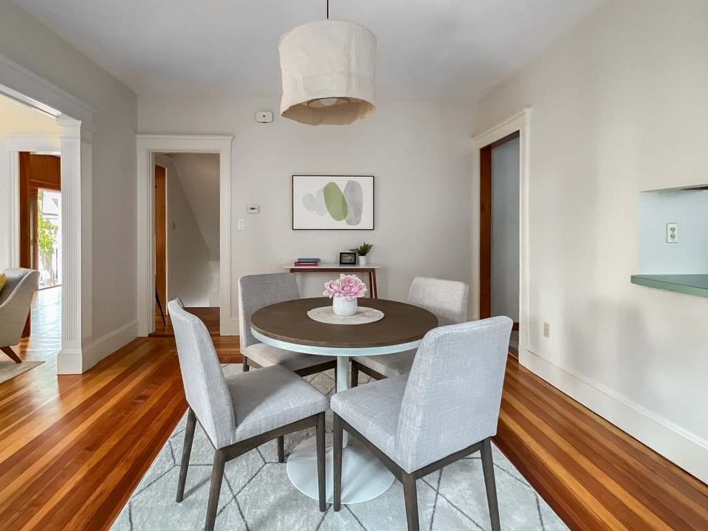 7 Gorham Road Medford, MA 02155 - Photo 7 of 42 a view of a dining room with furniture and wooden floor