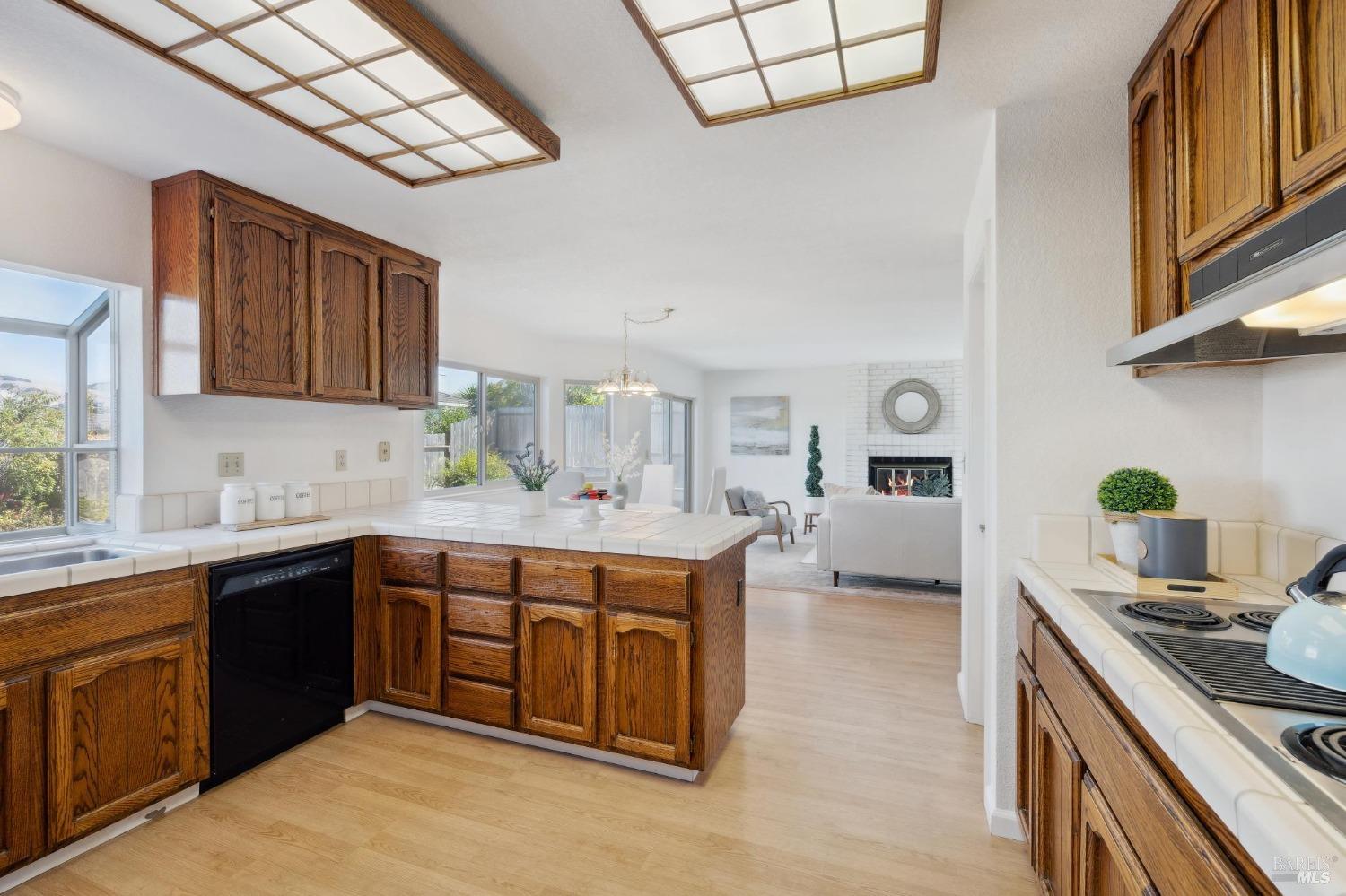 284 Preakness Lane Vallejo, CA 94591 - Photo 13 of 62 a kitchen with a sink cabinets and window