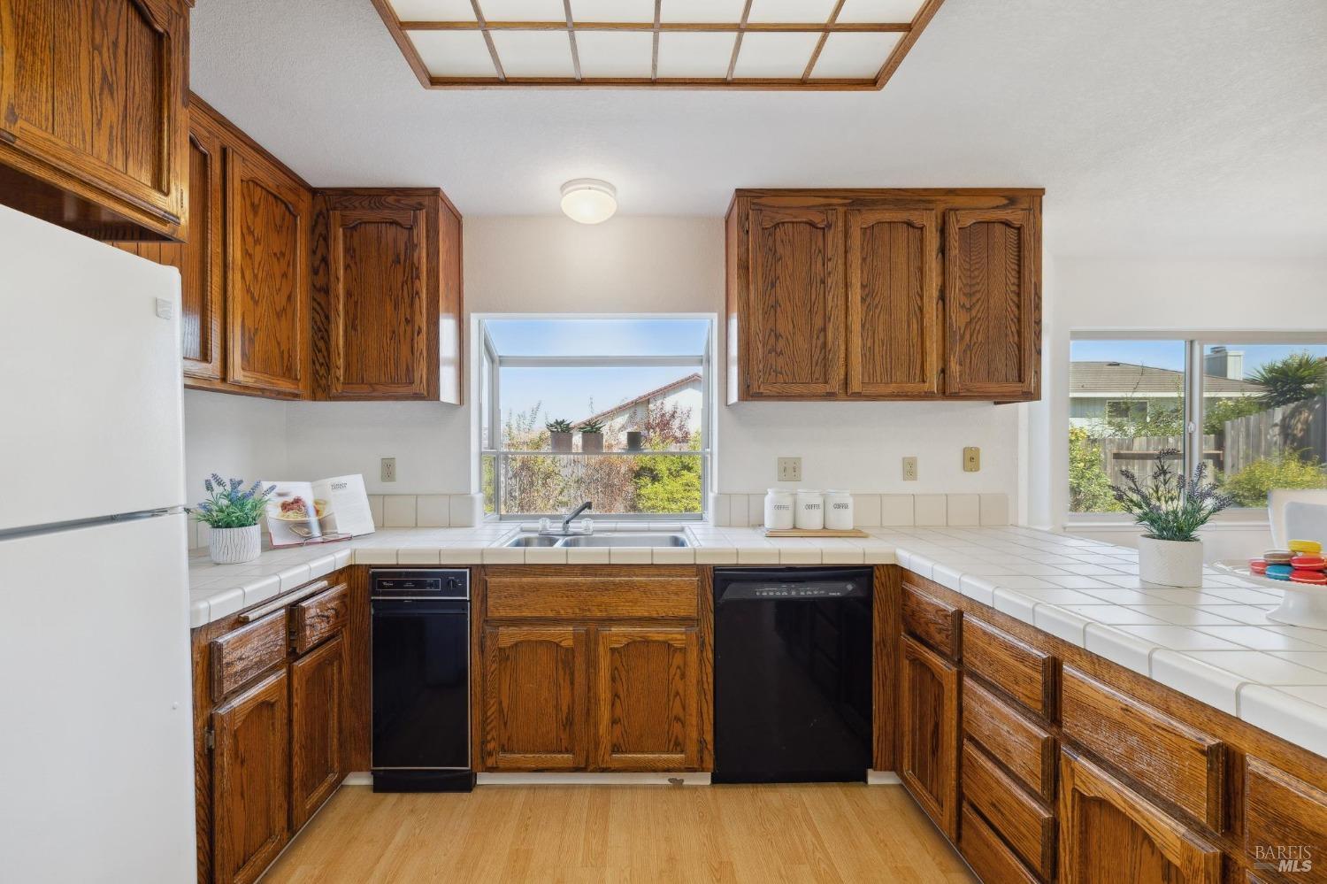 284 Preakness Lane Vallejo, CA 94591 - Photo 14 of 62 a kitchen with stainless steel appliances granite countertop a sink stove and cabinets
