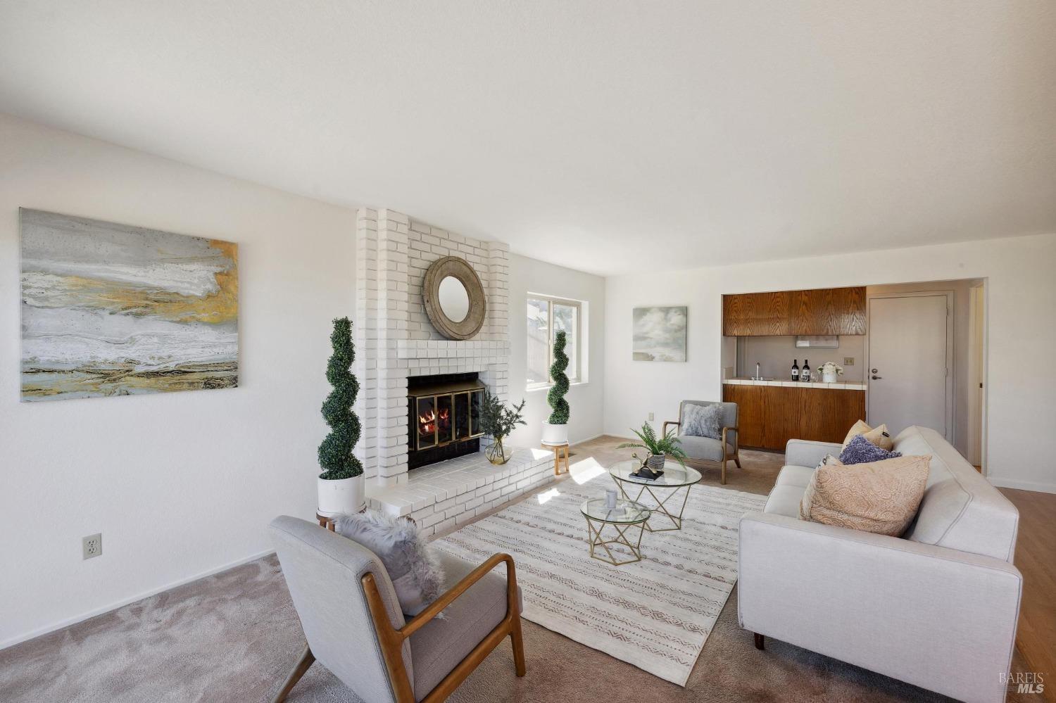 284 Preakness Lane Vallejo, CA 94591 - Photo 19 of 62 a living room with furniture a fireplace and a window