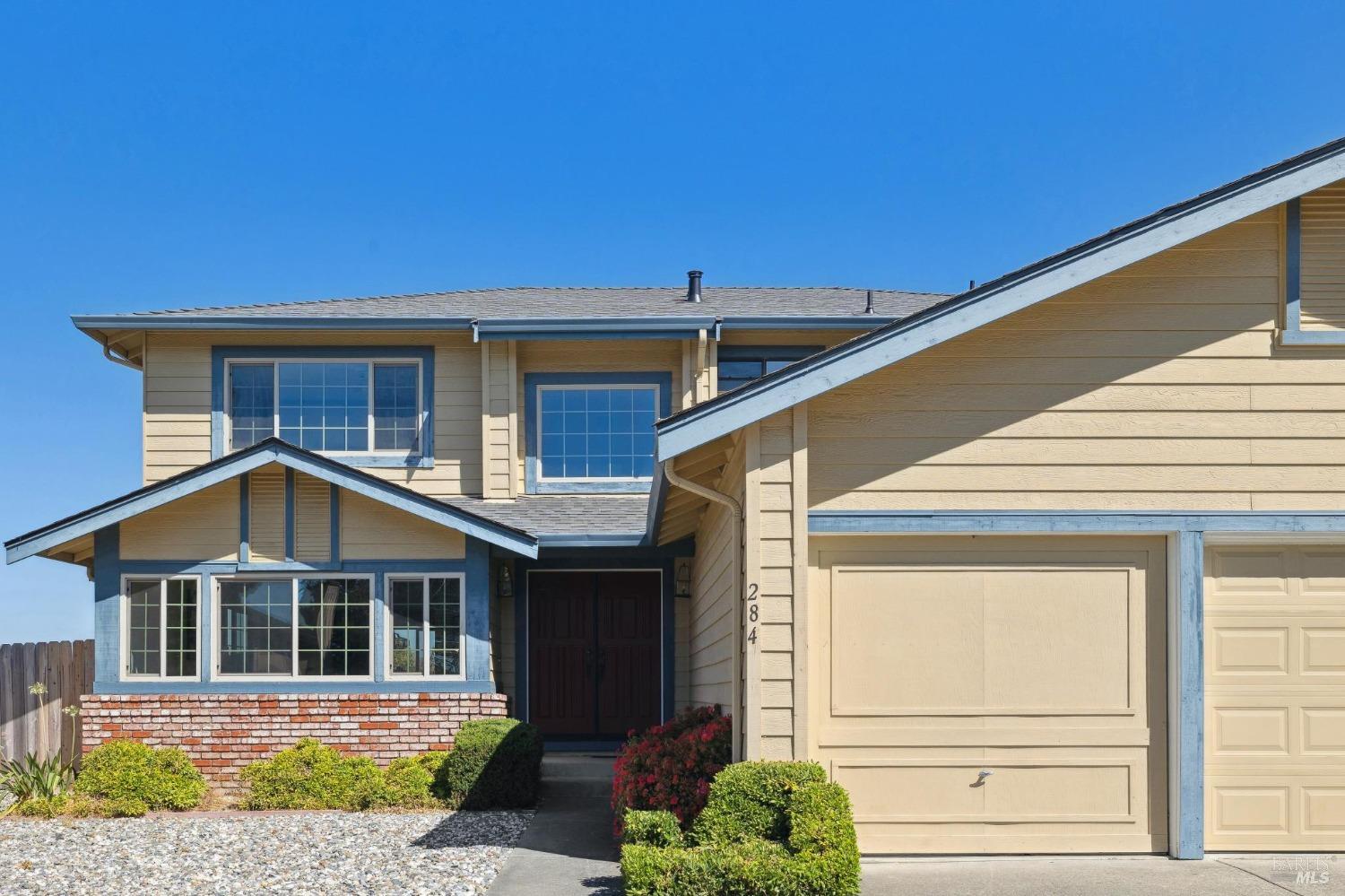 284 Preakness Lane Vallejo, CA 94591 - Photo 2 of 62 a front view of a house with a garden