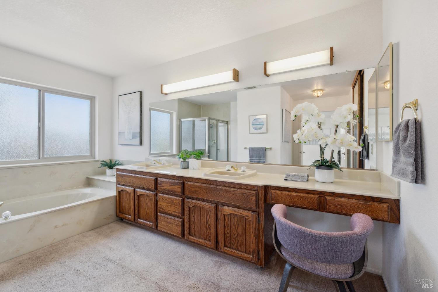 284 Preakness Lane Vallejo, CA 94591 - Photo 41 of 62 a spacious bathroom with a tub sink and mirror