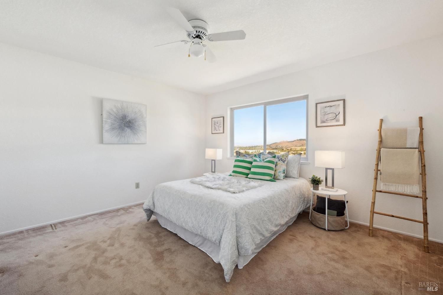 284 Preakness Lane Vallejo, CA 94591 - Photo 46 of 62 a bedroom with a bed and a lamp