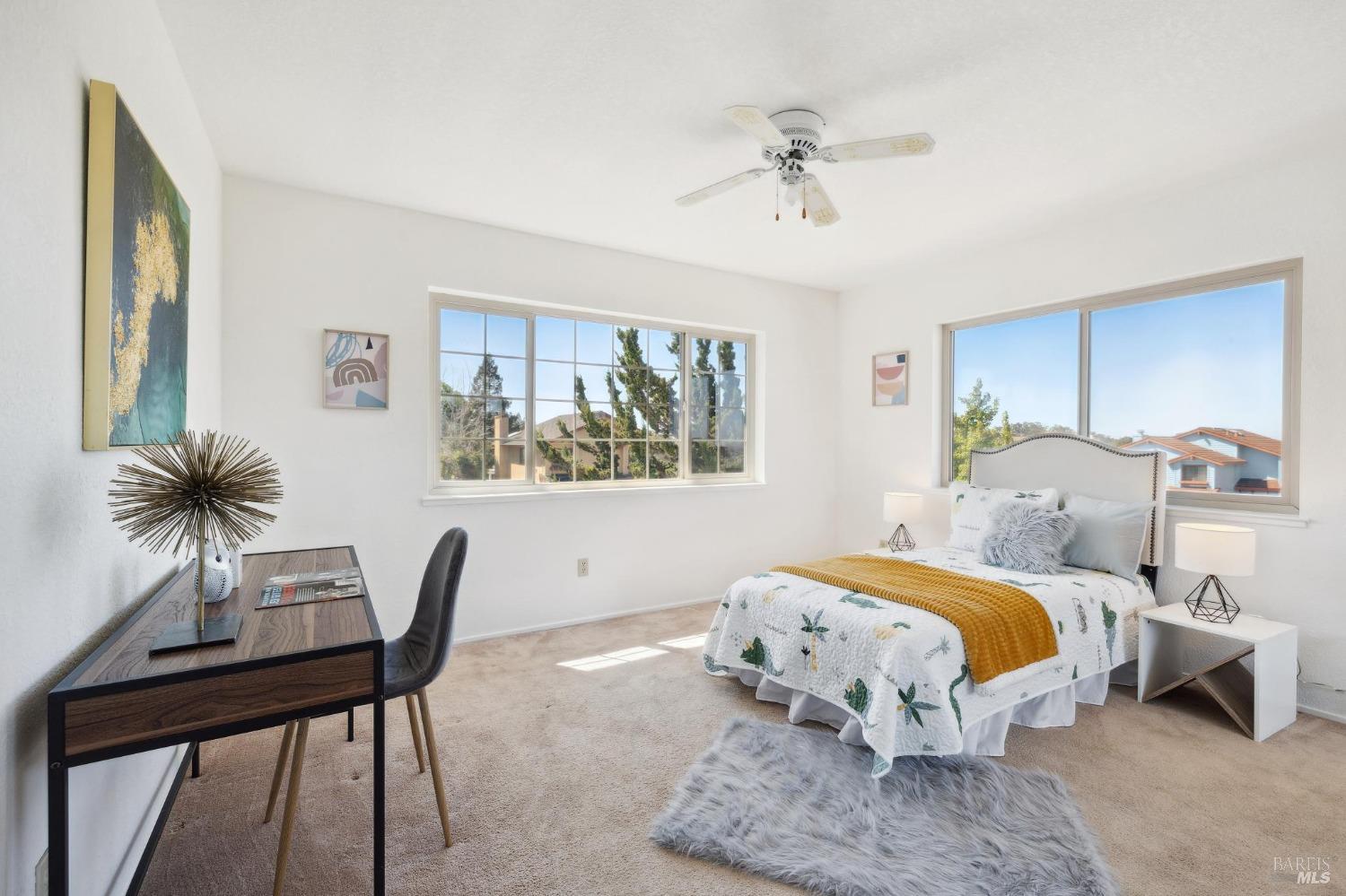 284 Preakness Lane Vallejo, CA 94591 - Photo 50 of 62 a bedroom with a bed and a table