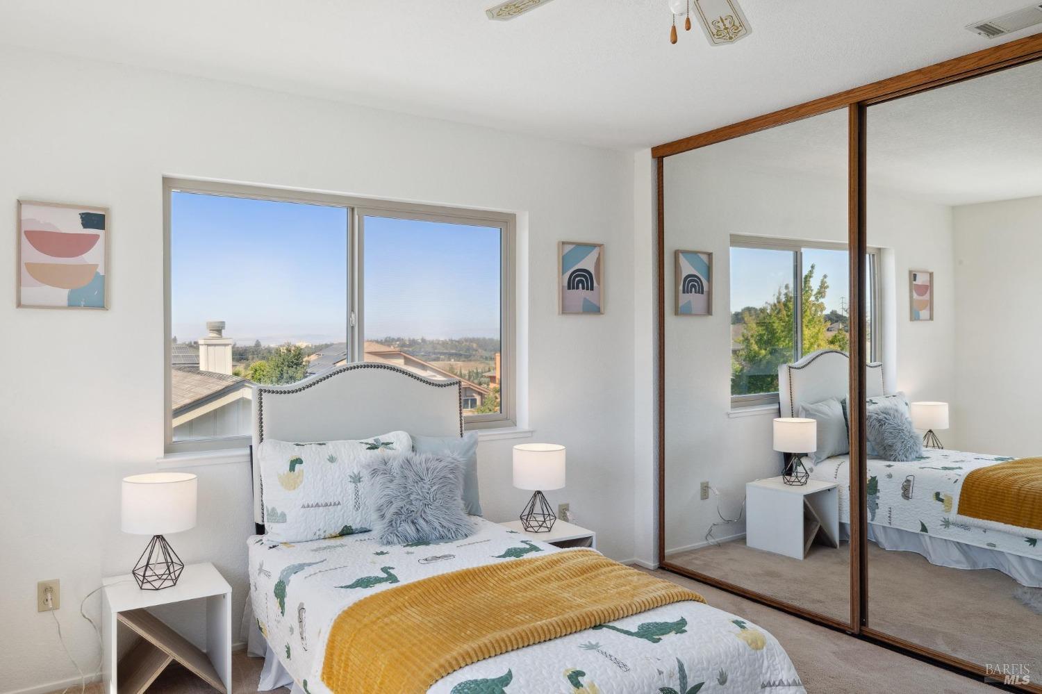 284 Preakness Lane Vallejo, CA 94591 - Photo 52 of 62 a bedroom with a bed and wooden floor