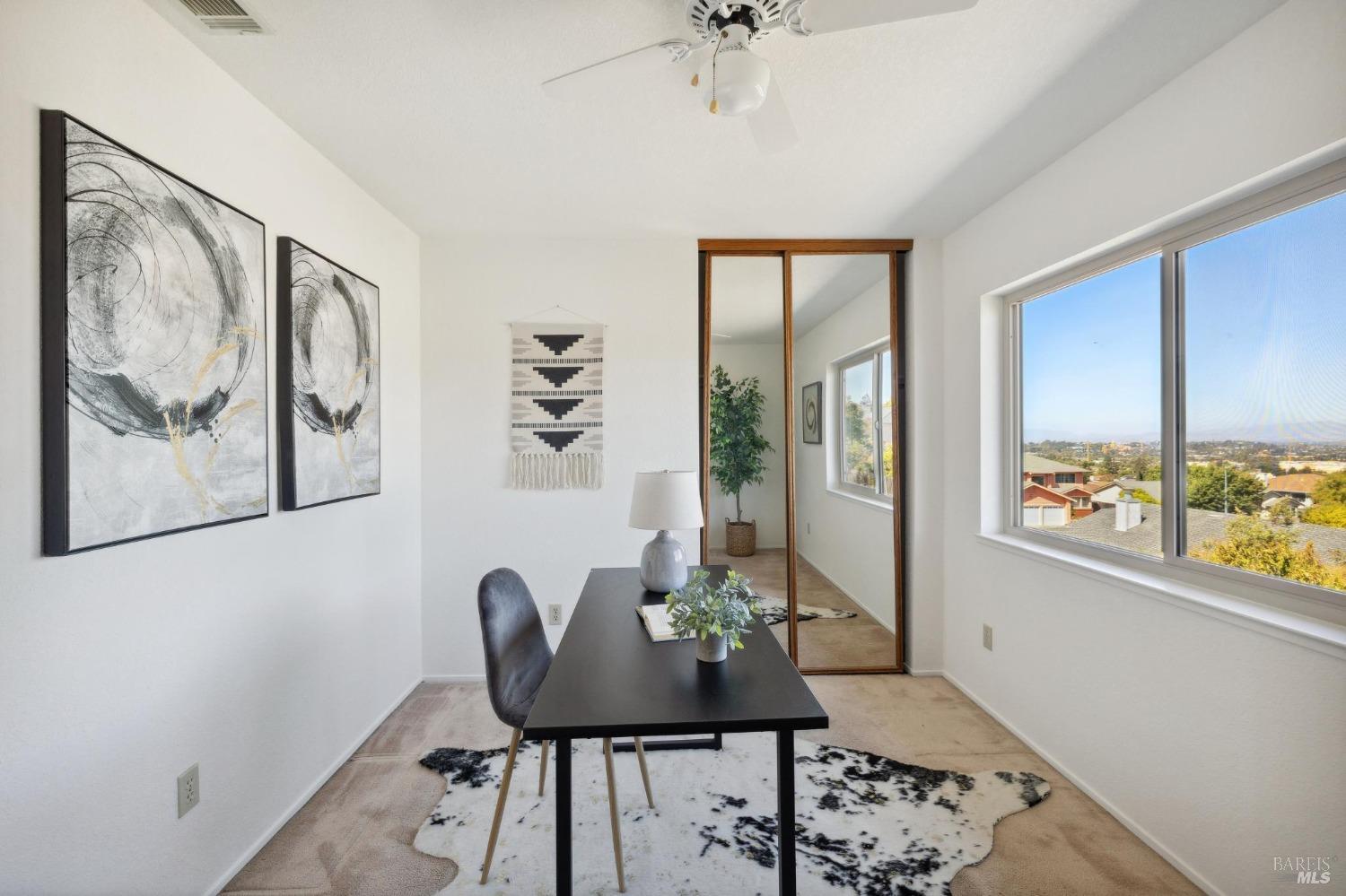 284 Preakness Lane Vallejo, CA 94591 - Photo 55 of 62 a view of a workspace with furniture and a window