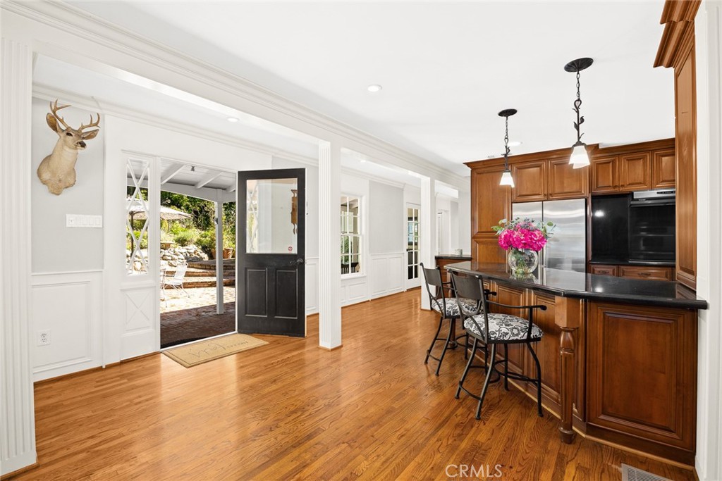 8 Hidden Valley Road Monrovia, CA 91016 - Photo 12 of 45 a view of a dining room with furniture window and wooden floor