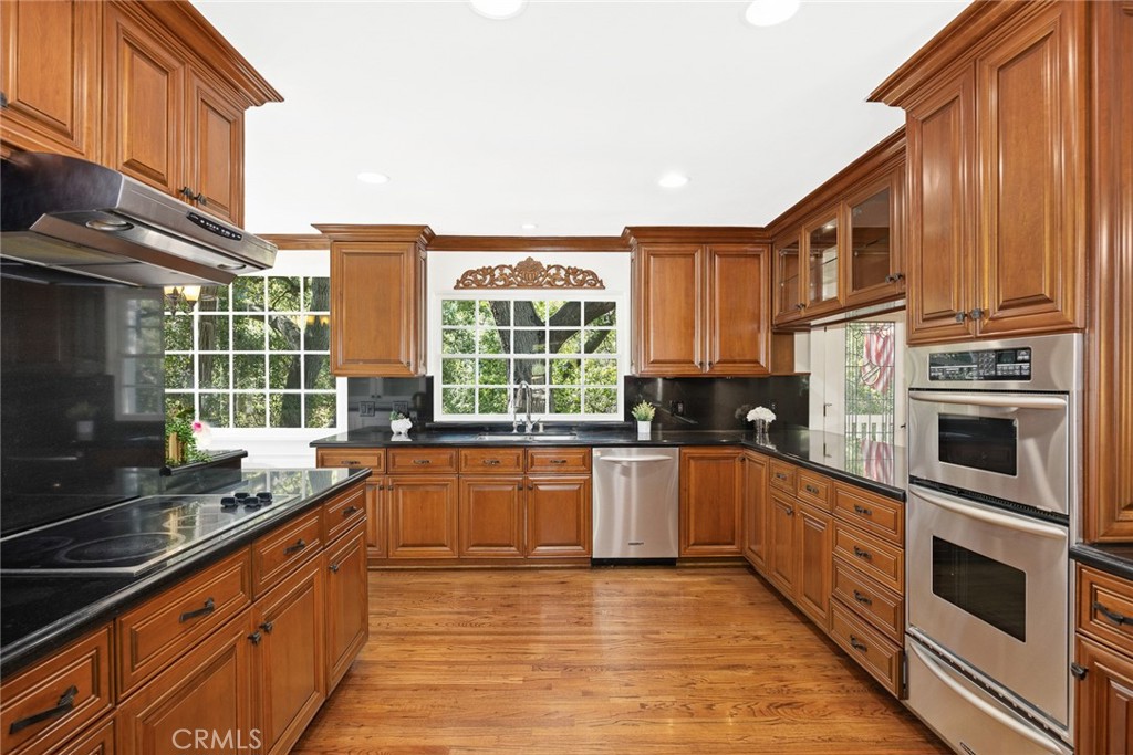 8 Hidden Valley Road Monrovia, CA 91016 - Photo 18 of 45 a kitchen with stainless steel appliances granite countertop a stove and a sink
