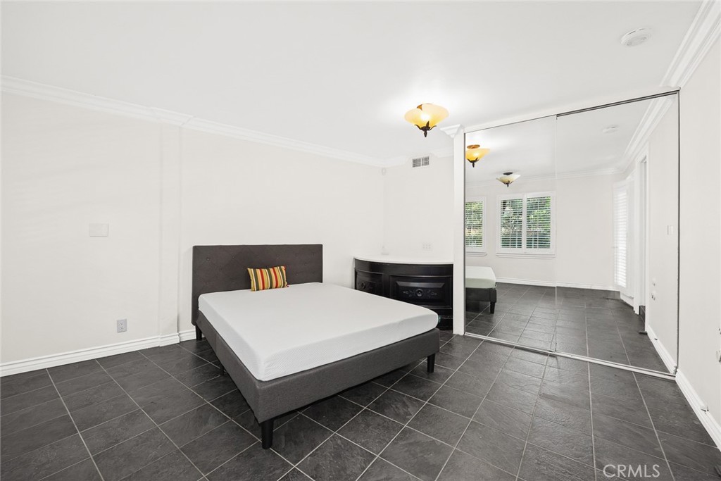 8 Hidden Valley Road Monrovia, CA 91016 - Photo 29 of 45 a room with a bed and a window