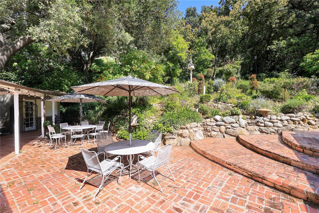 8 Hidden Valley Road Monrovia, CA 91016 - Photo 8 of 45 a view of backyard with outdoor seating and trees