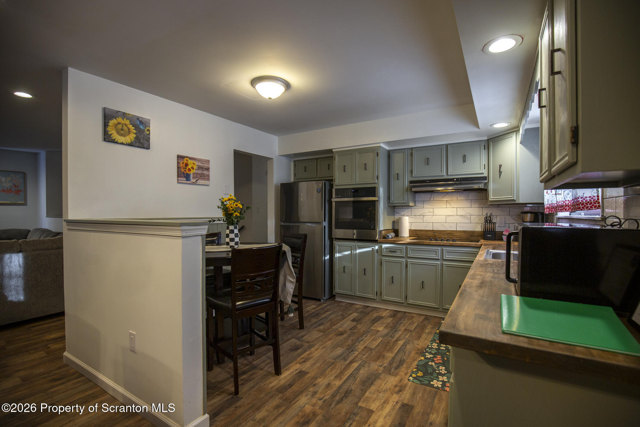 544 Sullivan Trail Long Pond, PA 18334 - Photo 19 of 68 a kitchen with stainless steel appliances granite countertop a refrigerator and a stove