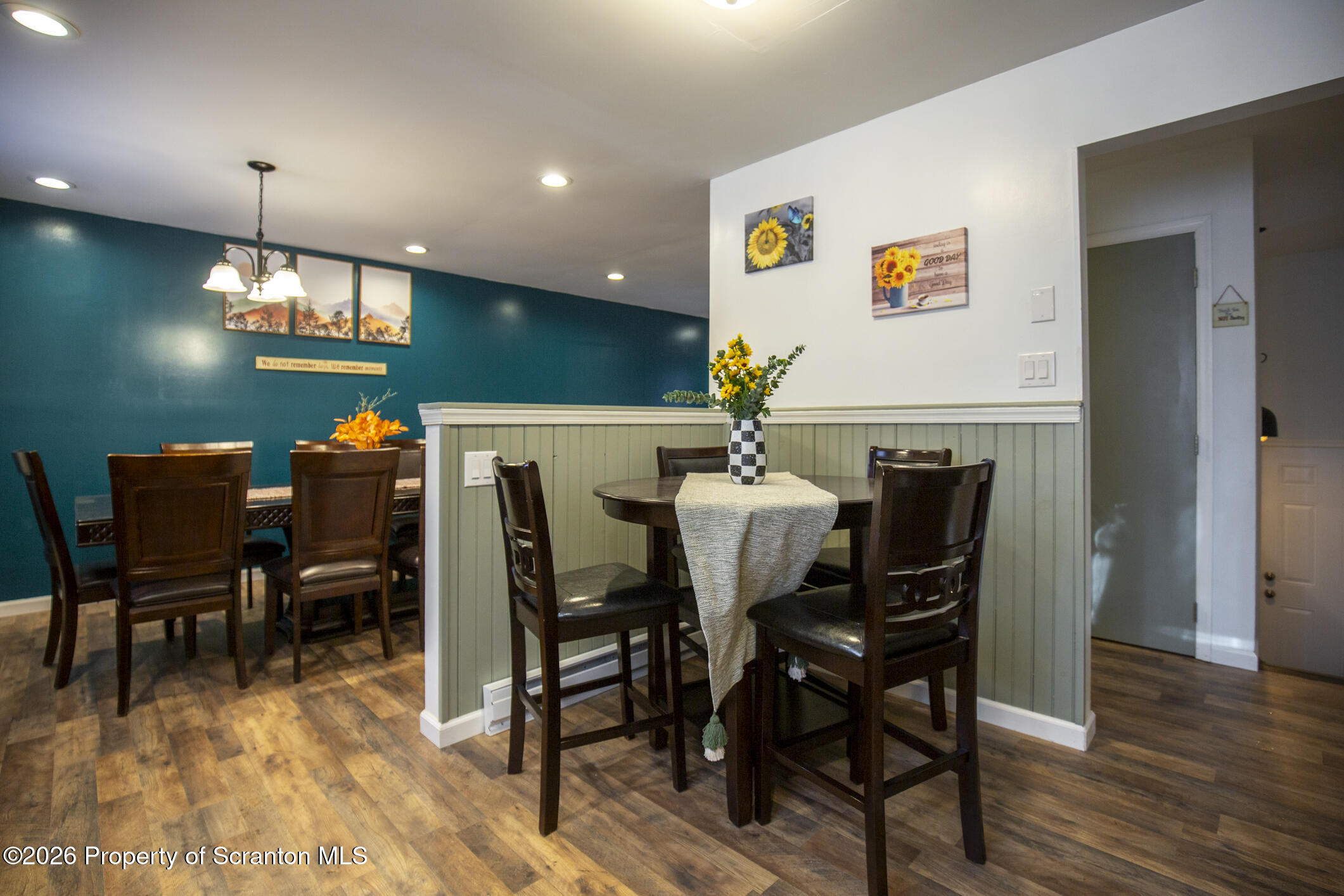 544 Sullivan Trail Long Pond, PA 18334 - Photo 20 of 68 a view of a dining room with furniture and wooden floor