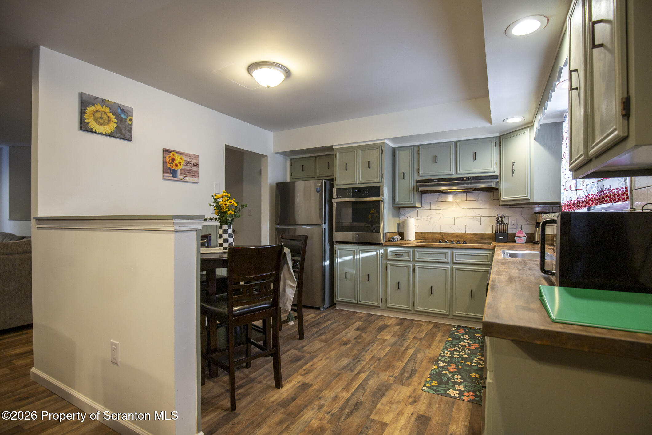 544 Sullivan Trail Long Pond, PA 18334 - Photo 22 of 68 a kitchen with stainless steel appliances granite countertop a refrigerator and a stove