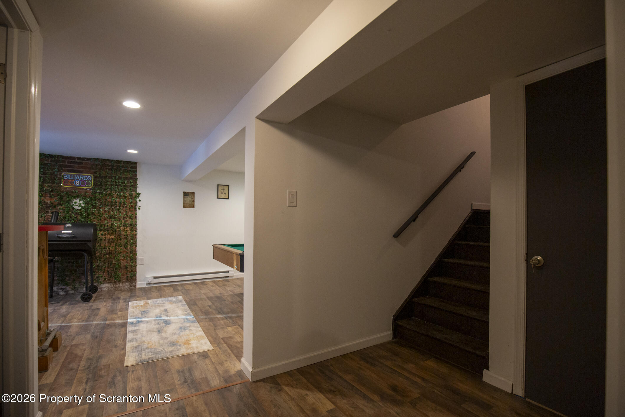 544 Sullivan Trail Long Pond, PA 18334 - Photo 25 of 68 a view of entryway with wooden floor and stairs