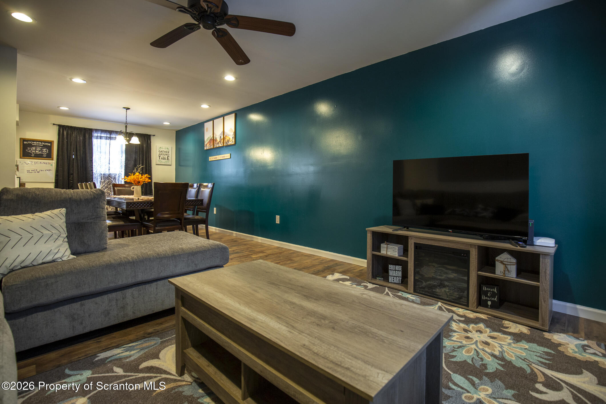 544 Sullivan Trail Long Pond, PA 18334 - Photo 28 of 68 a living room with furniture and a flat screen tv