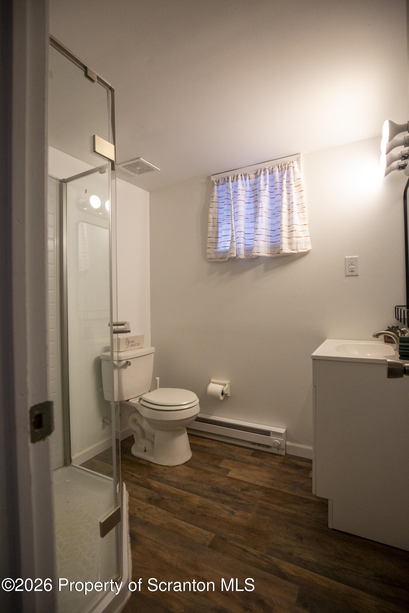 544 Sullivan Trail Long Pond, PA 18334 - Photo 40 of 68 a bathroom with a toilet a sink and mirror