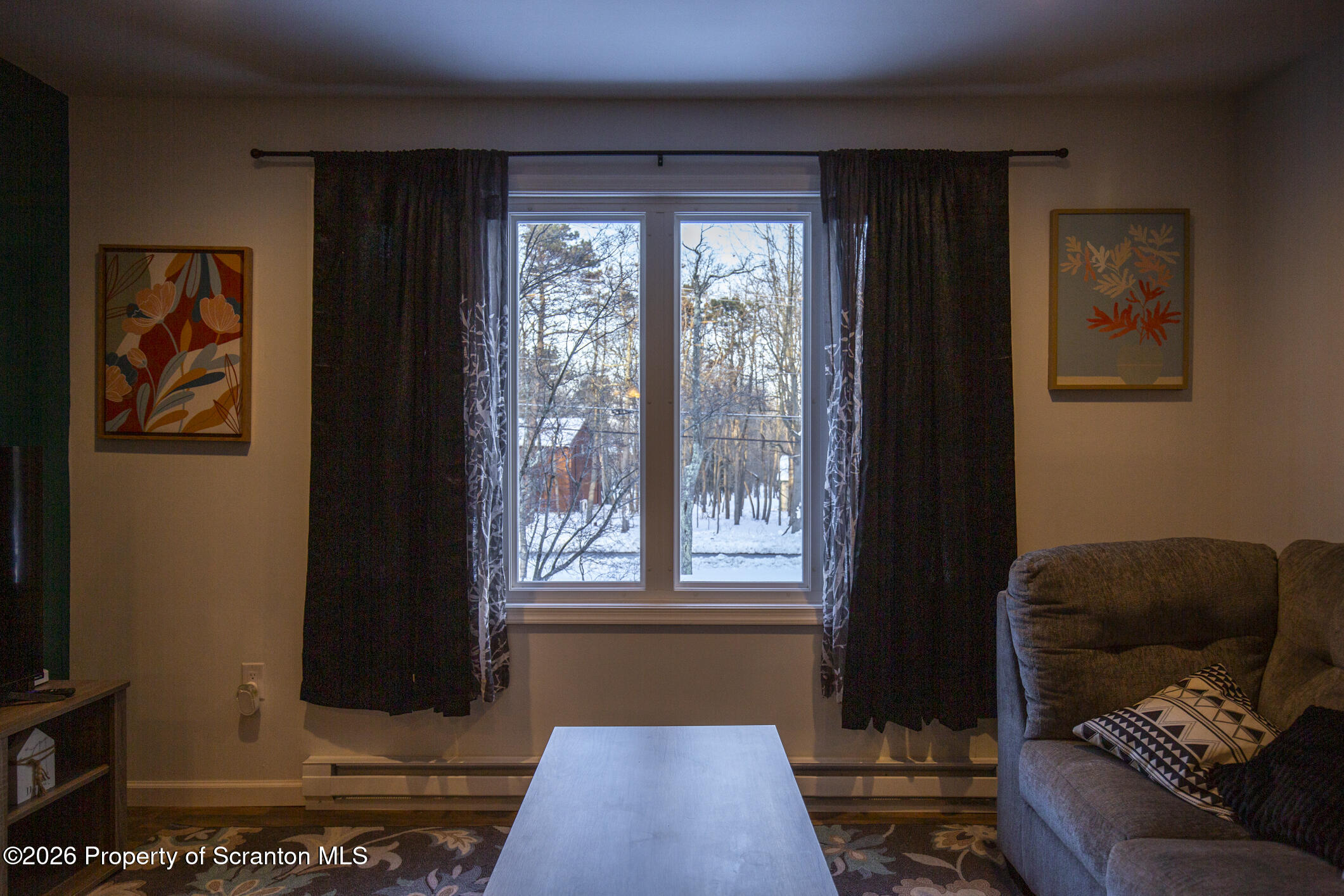 544 Sullivan Trail Long Pond, PA 18334 - Photo 56 of 68 a living room with furniture and a window