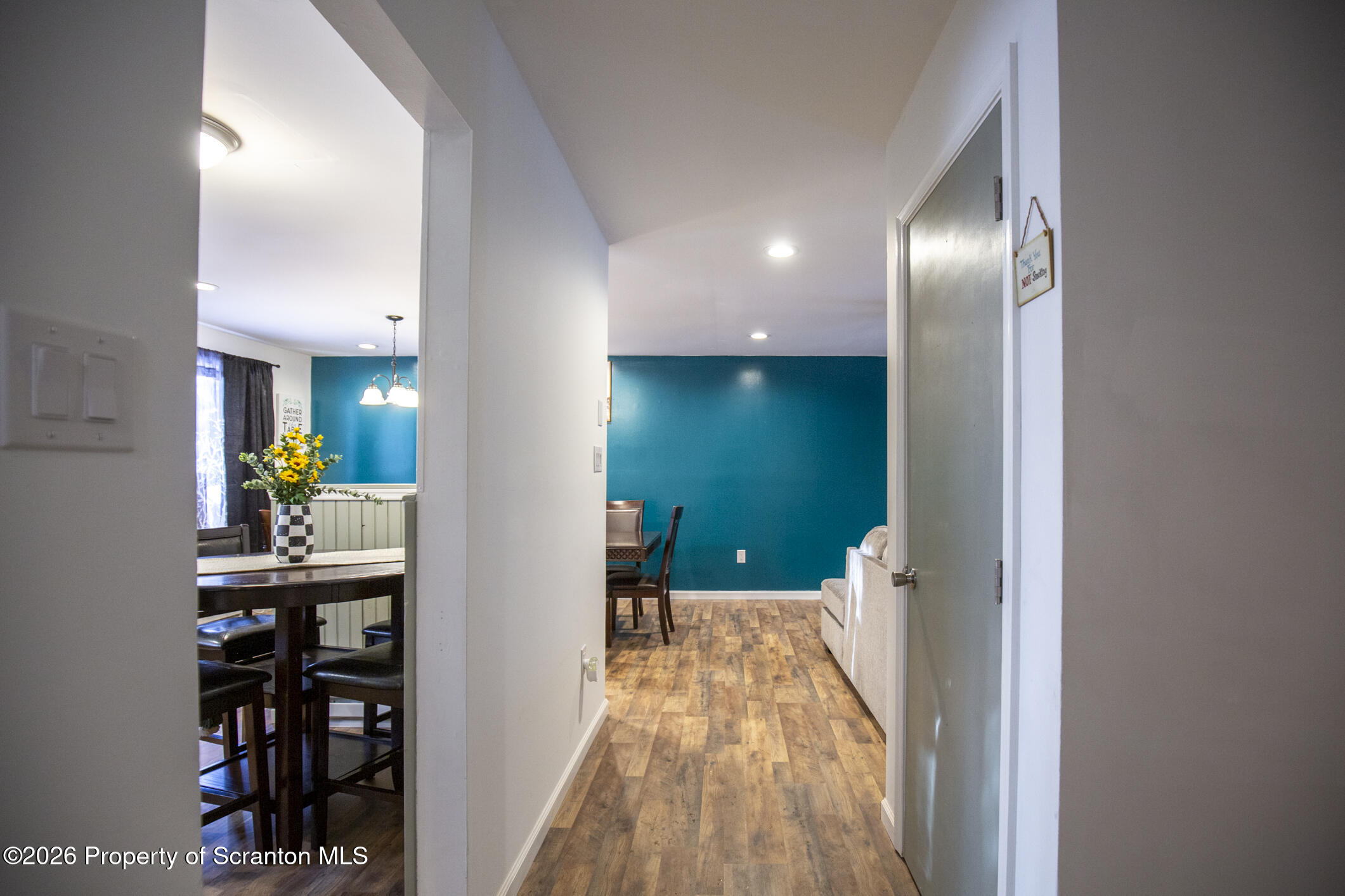 544 Sullivan Trail Long Pond, PA 18334 - Photo 67 of 68 a view of a hallway with wooden floor and windows