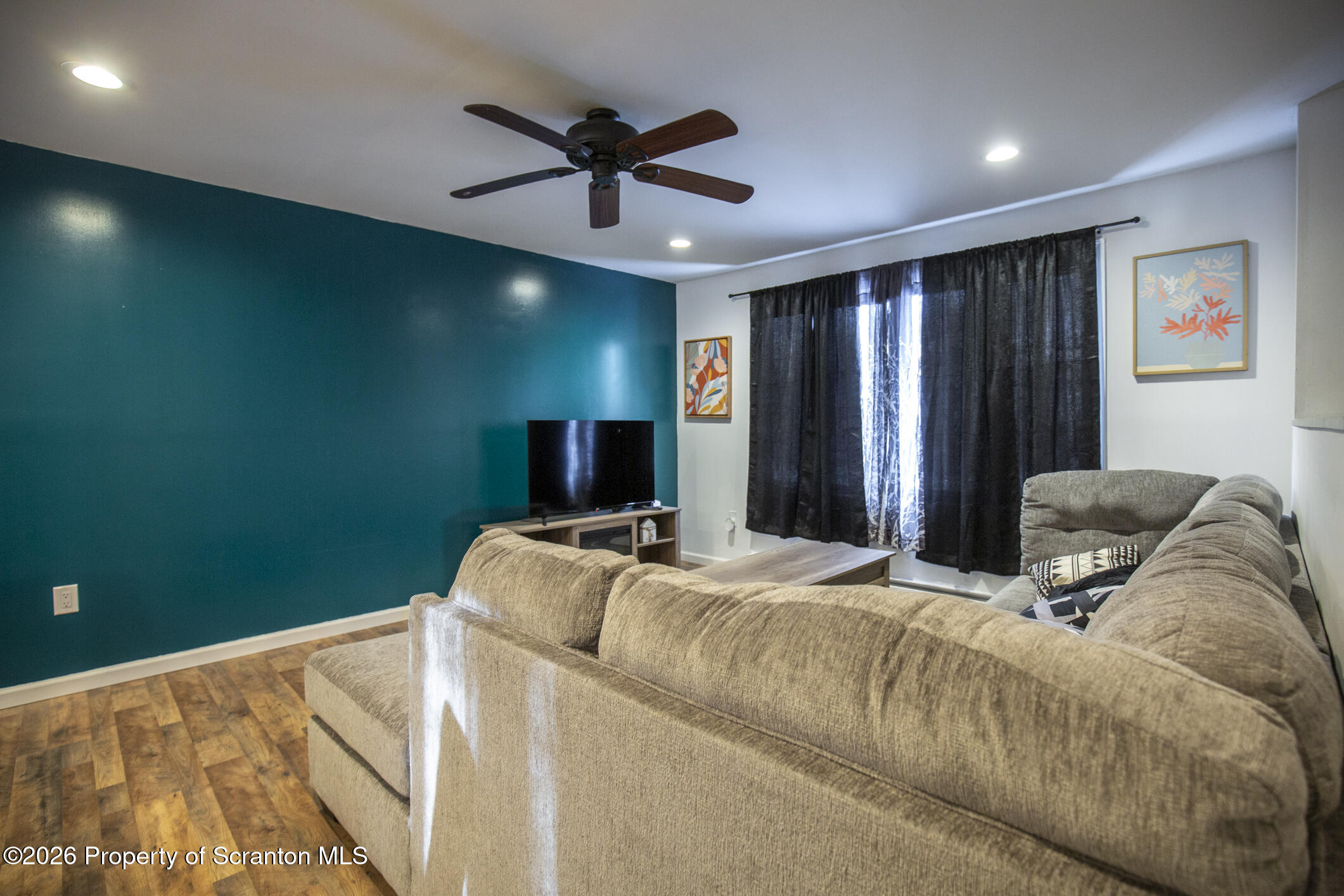 544 Sullivan Trail Long Pond, PA 18334 - Photo 68 of 68 a bed room with a bed and a television