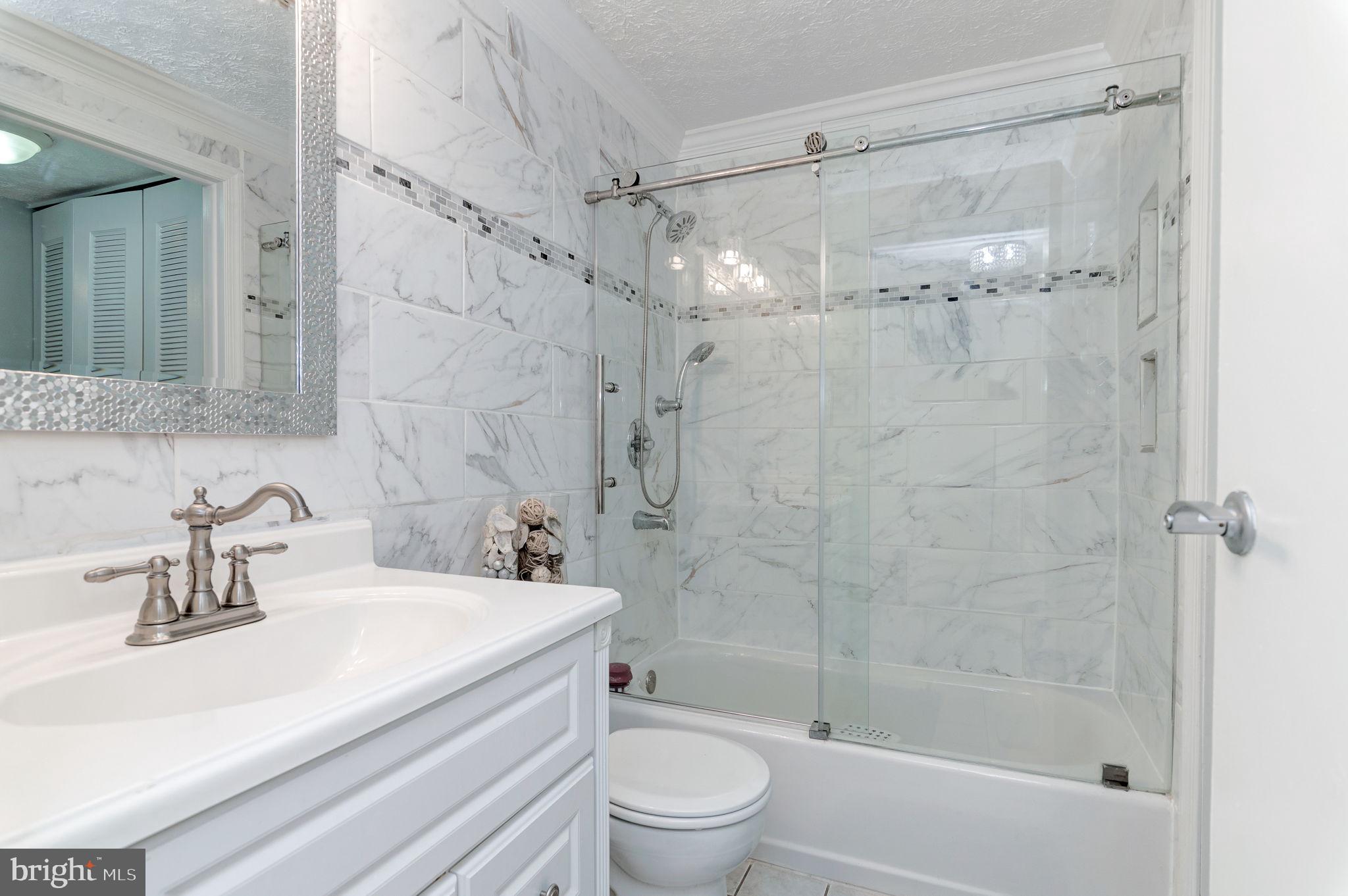 8303 Windfall Road Springfield, VA 22153 - Photo 20 of 42 Updated Full Bath on Upper Level