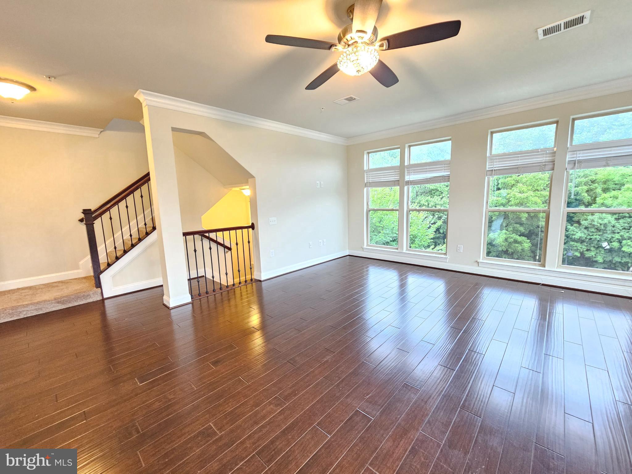 164 Copley Circle, Unit 27B Gaithersburg, MD 20878 - Photo 12 of 34 a view of an entryway with wooden floor