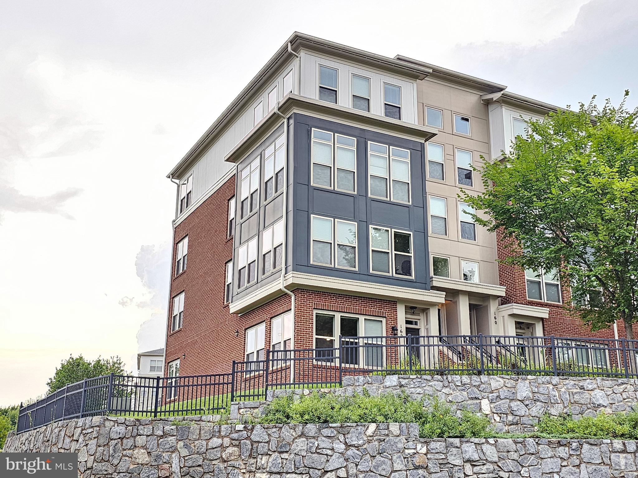 164 Copley Circle, Unit 27B Gaithersburg, MD 20878 - Photo 2 of 34 a front view of a building