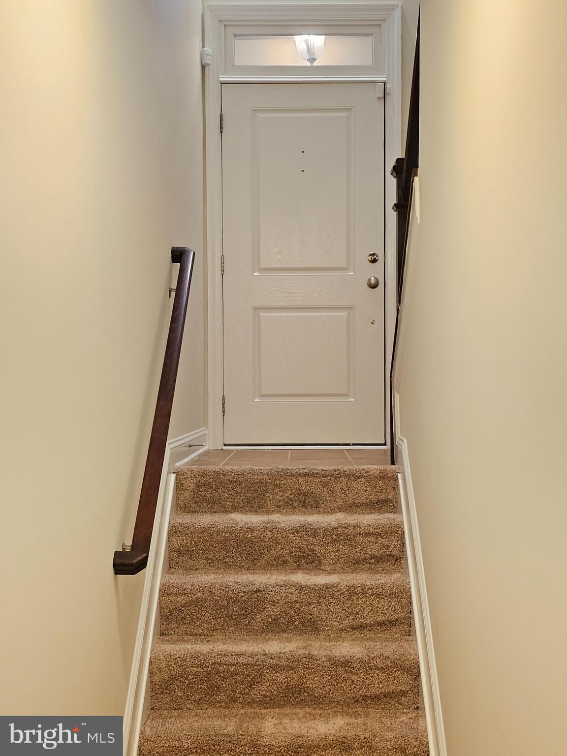 164 Copley Circle, Unit 27B Gaithersburg, MD 20878 - Photo 5 of 34 a view of staircase with white walls