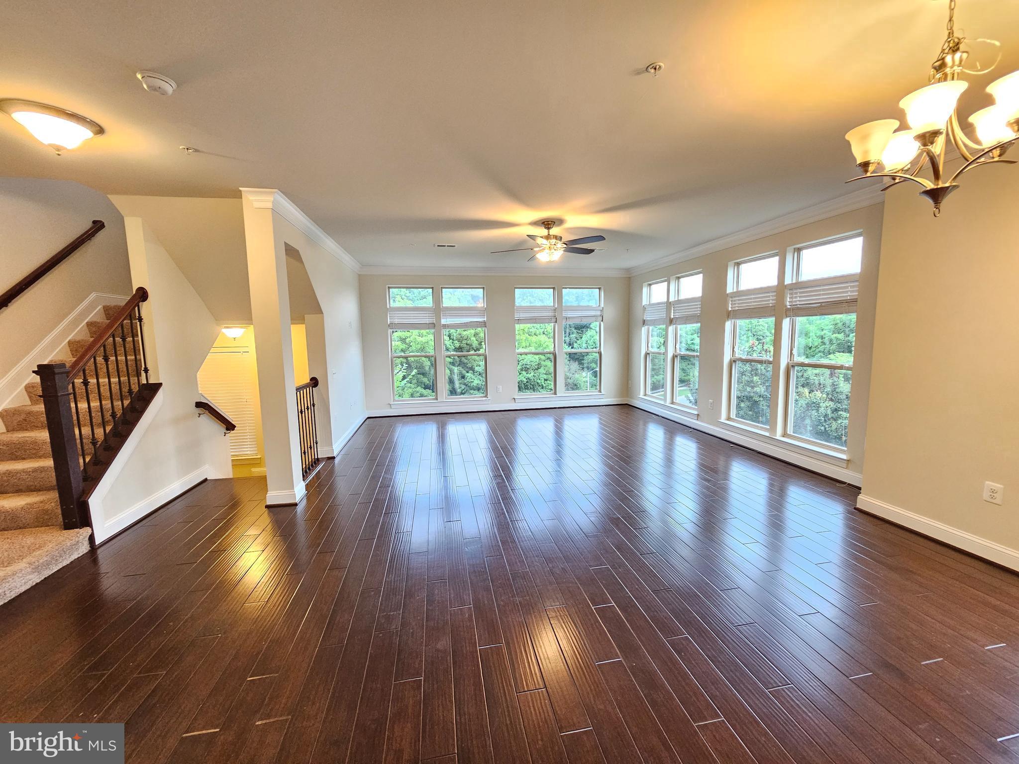 164 Copley Circle, Unit 27B Gaithersburg, MD 20878 - Photo 6 of 34 a view of an entryway with wooden floor