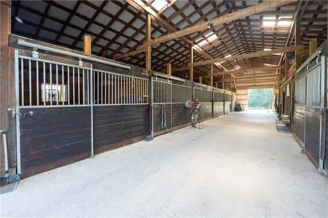 a view of a room with wooden walls