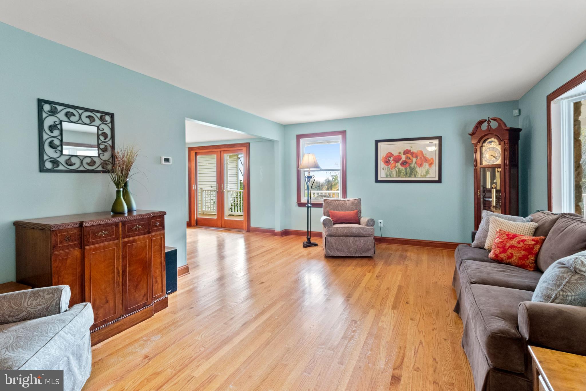 393 Township Line Road Chalfont, PA 18914 - Photo 14 of 56 Living room flows into the dining room