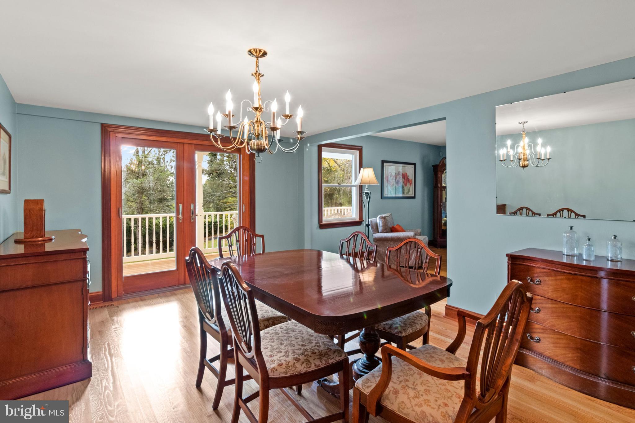 393 Township Line Road Chalfont, PA 18914 - Photo 15 of 56 Formal dining room leads to wrap around porch