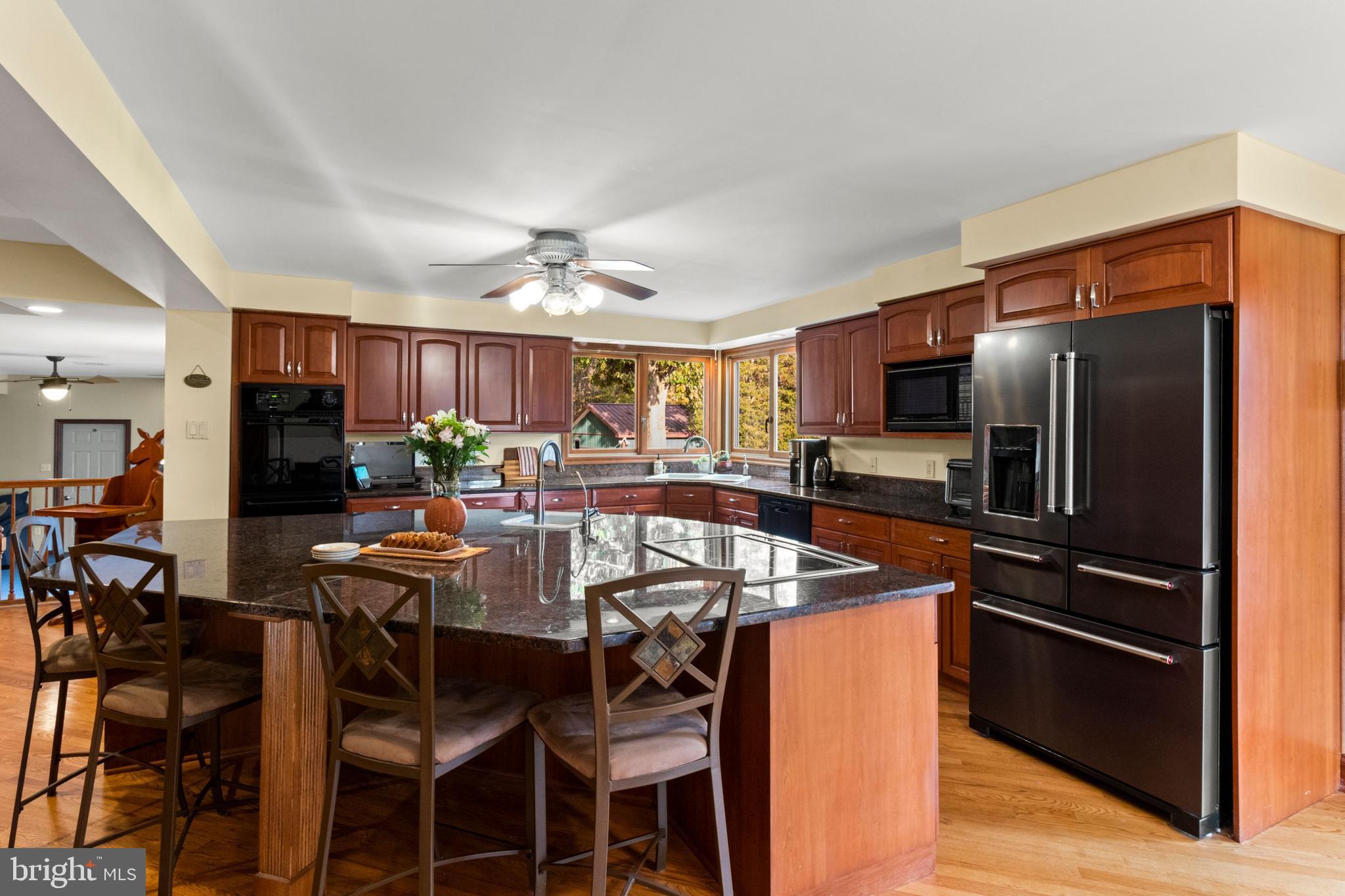 393 Township Line Road Chalfont, PA 18914 - Photo 18 of 56 Large center island with prep sink & cooktop