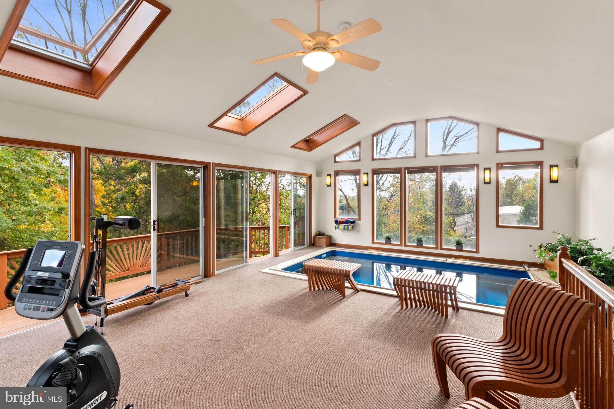 393 Township Line Road Chalfont, PA 18914 - Photo 26 of 56 Fitness room with walls of windows