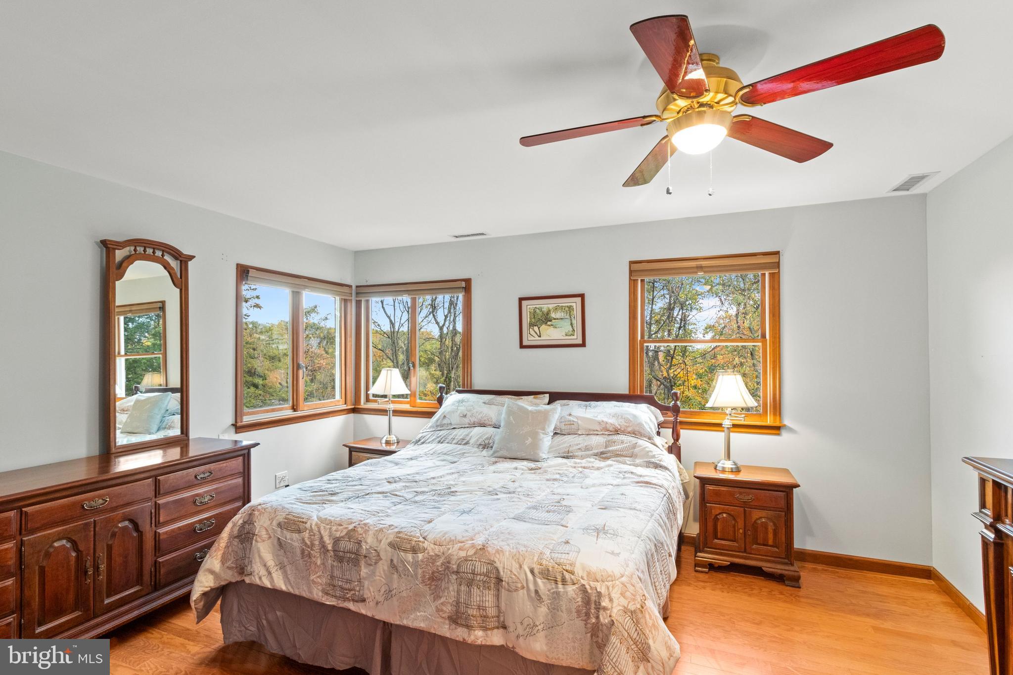 393 Township Line Road Chalfont, PA 18914 - Photo 33 of 56 Primary bedroom with wood floors