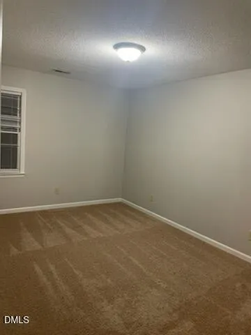 an empty room with a workbench