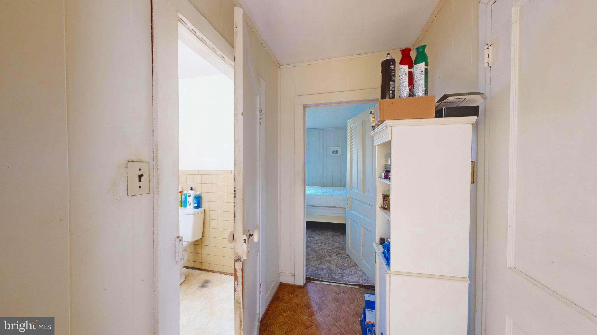 11939 Willow Grove Road Camden Wyoming, DE 19934 - Photo 11 of 31 Hall to Bathroom and Bedroom