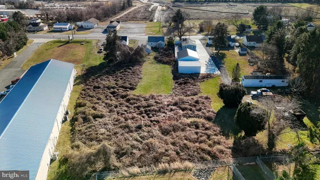 a aerial view of a house with a garden