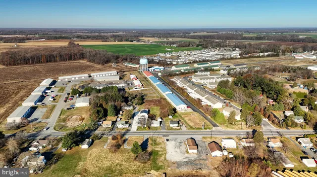 an aerial view of residential building and parking space