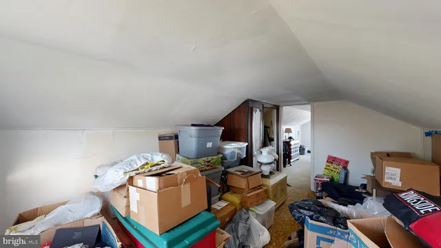 a room with furniture and a mirror