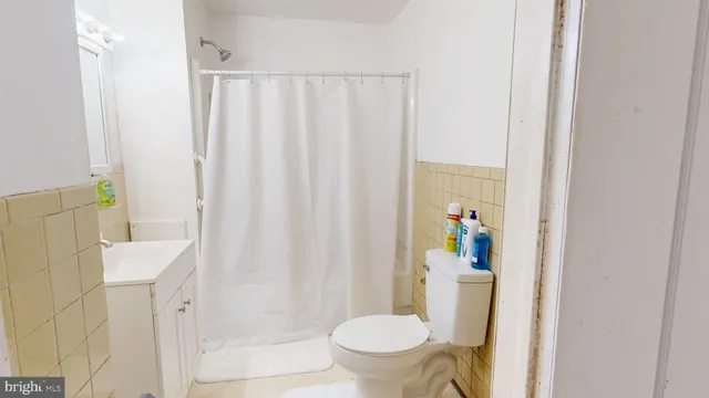 a bathroom with a sink and toilet