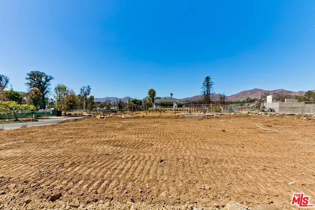 a view of street with houses