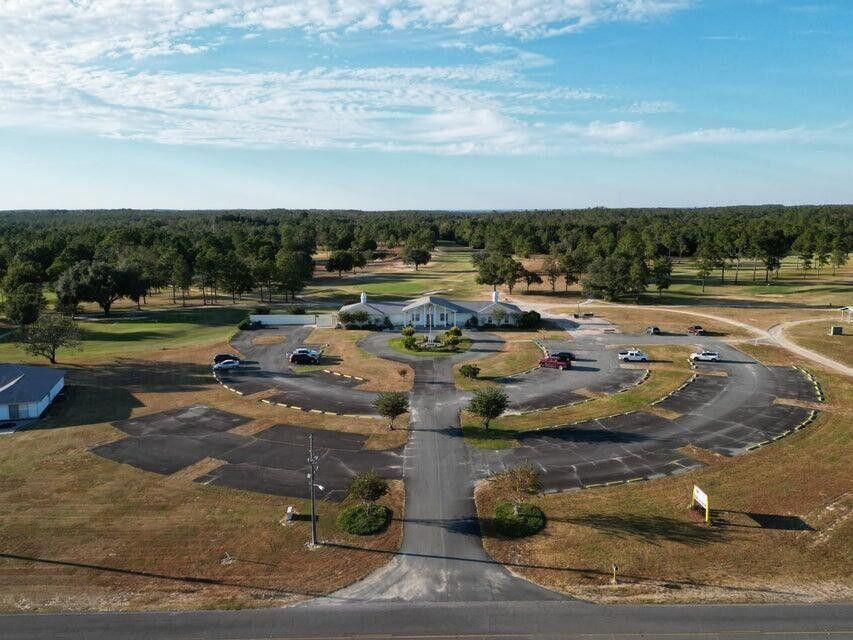 Lot 12 Windbrook Street Chipley, FL 32428 - Photo 6 of 11 a view of a lake with outdoor space