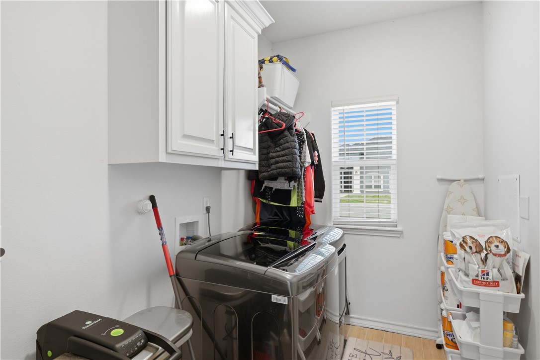 105 Sapphire Street Portland, TX 78374 - Photo 15 of 29 a room with storage and utility