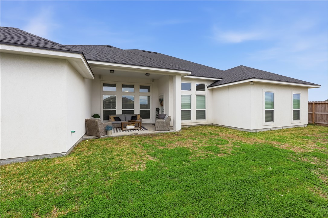 105 Sapphire Street Portland, TX 78374 - Photo 29 of 29 a view of a house with pool and chairs