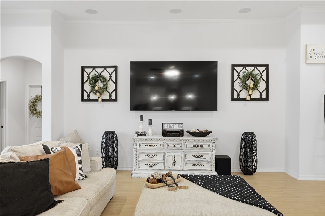 105 Sapphire Street Portland, TX 78374 - Photo 9 of 29 a bedroom with a bed and a flat screen tv