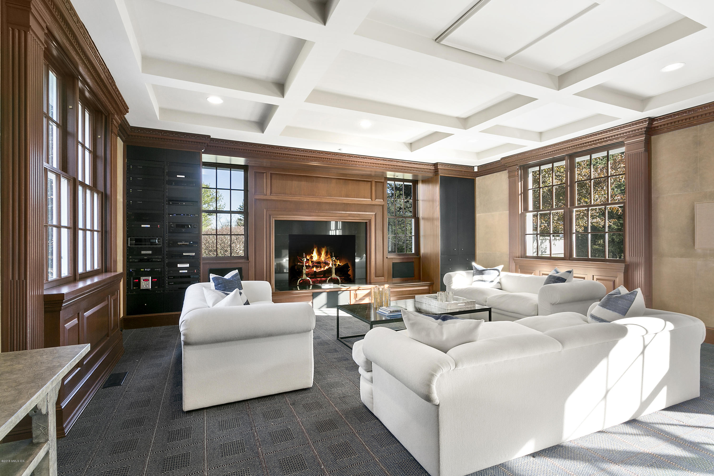 20 Andrews Farm Road Greenwich, CT 06831 - Photo 16 of 39 a living room with fireplace furniture and a large window