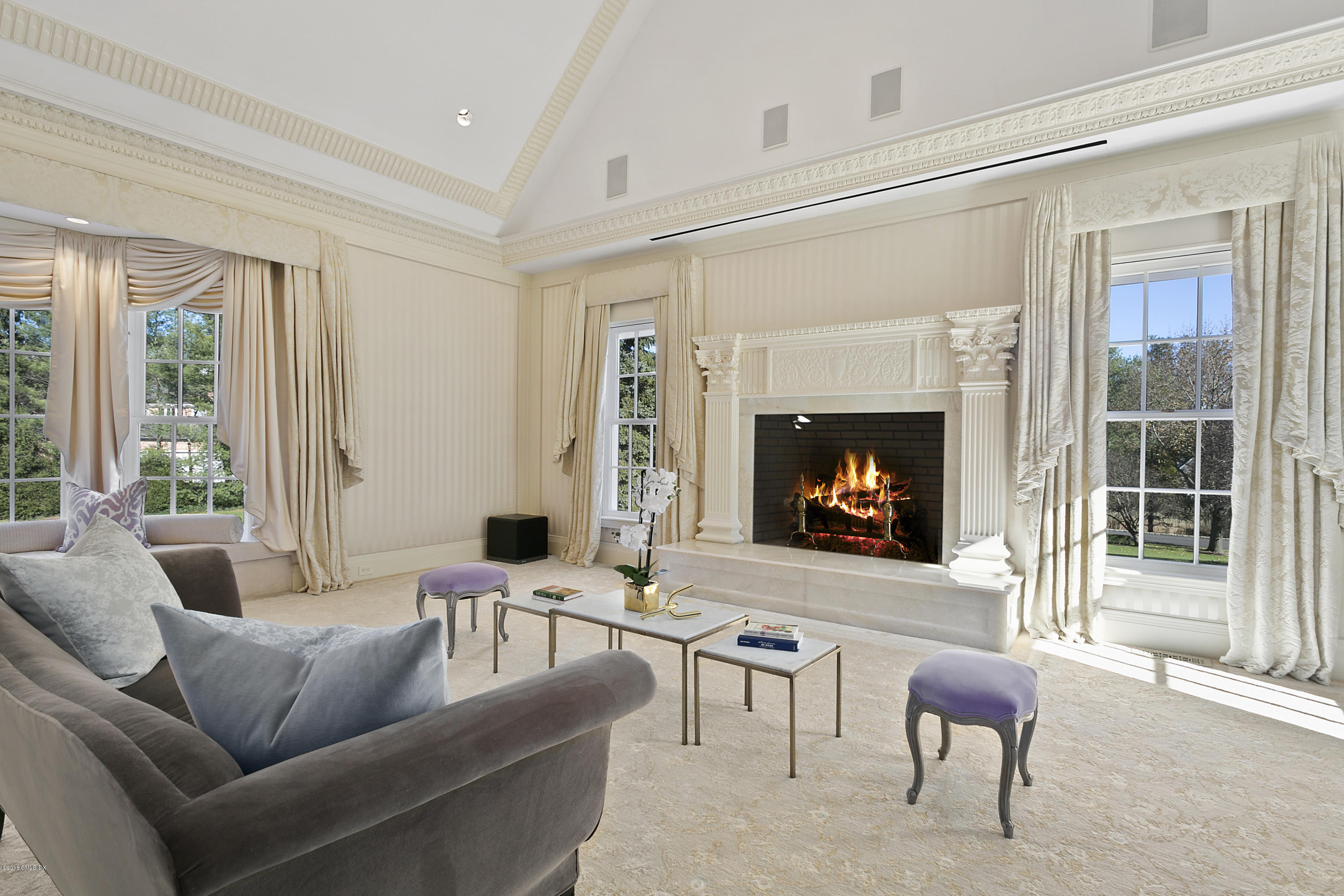 20 Andrews Farm Road Greenwich, CT 06831 - Photo 18 of 39 a living room with furniture and a fireplace