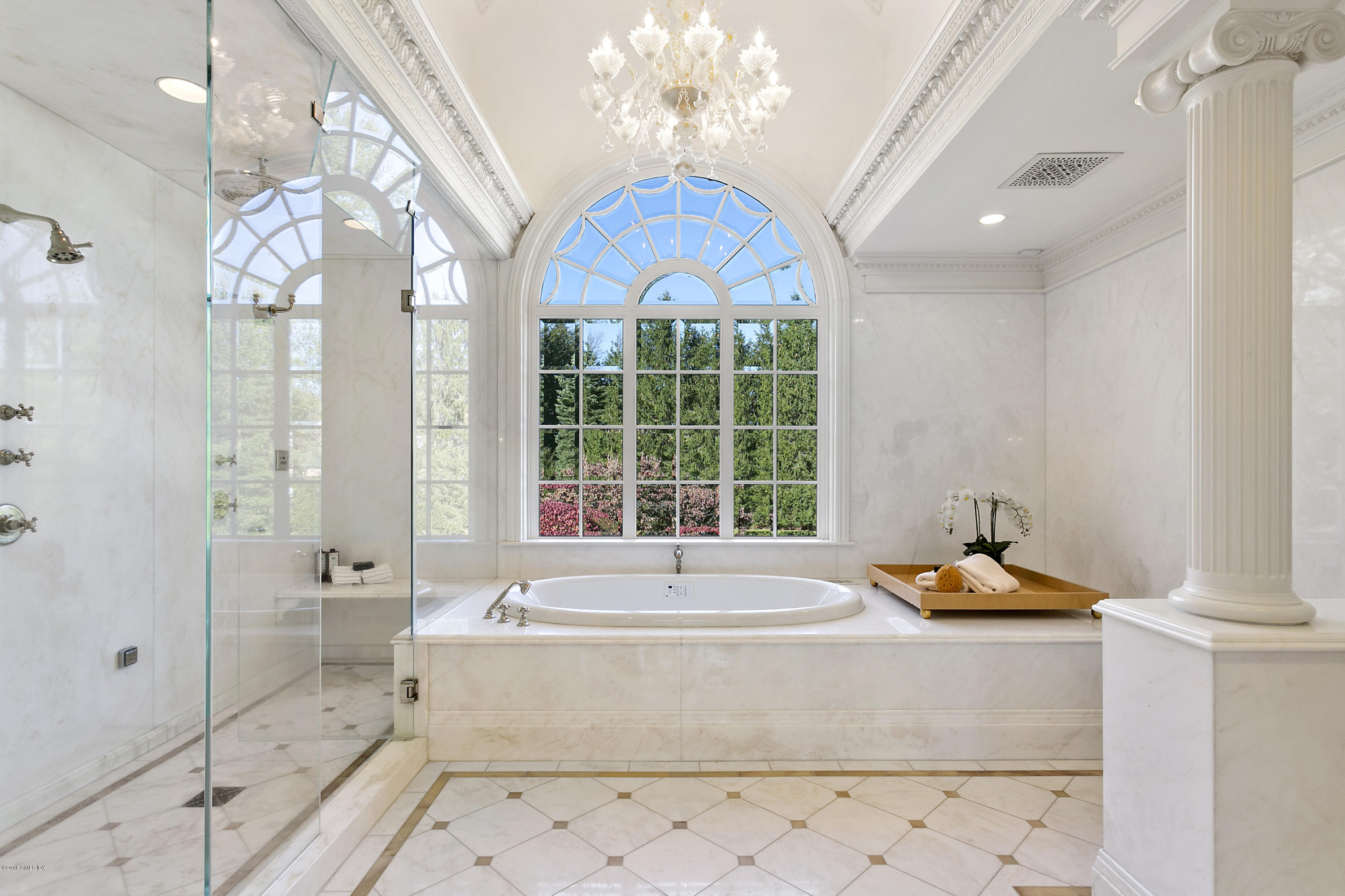 20 Andrews Farm Road Greenwich, CT 06831 - Photo 20 of 39 a living room with a chandelier and fireplace