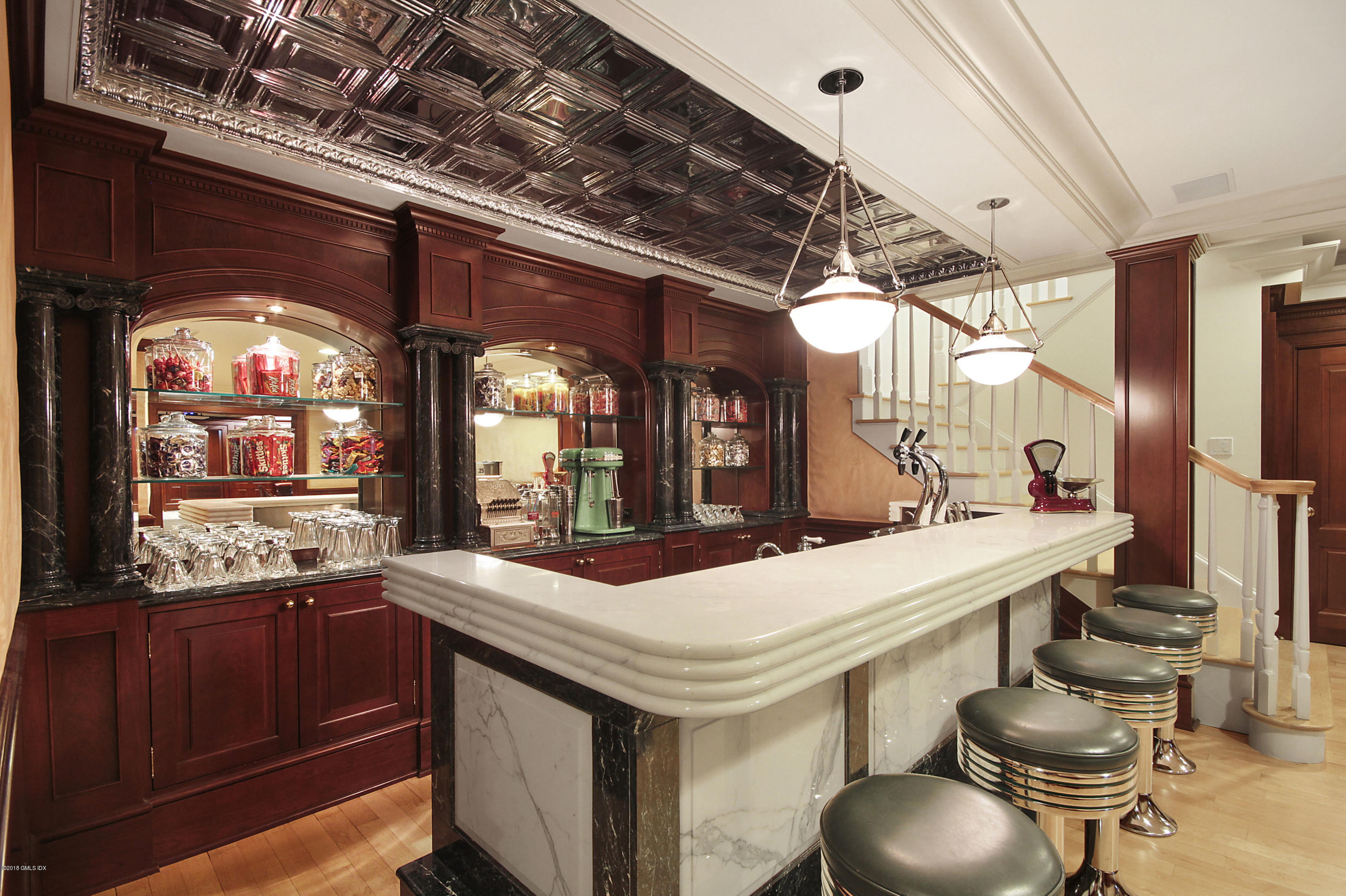 20 Andrews Farm Road Greenwich, CT 06831 - Photo 29 of 39 a large kitchen with a table and chairs